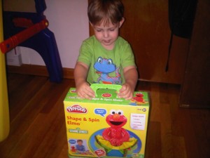 "Play-Doh Shape and Spin Elmo"